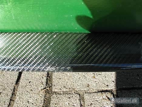 VW Caddy TIL SALG - Kulfiber læben foran billede 15