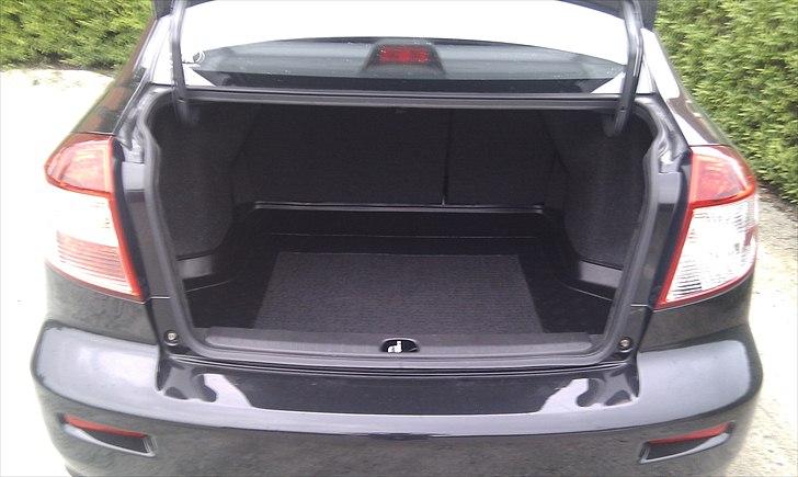 Suzuki SX4 Sedan Solgt - Dejlig med så stort bagagerum. billede 10