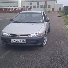 Mitsubishi Lancer gli totalskadet