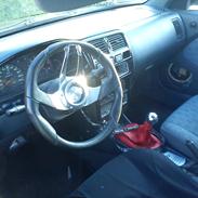 Nissan almera (basse)