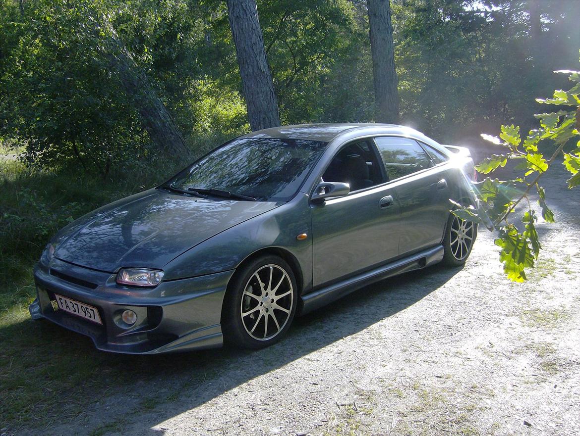 Mazda 323f SOLGT billede 1