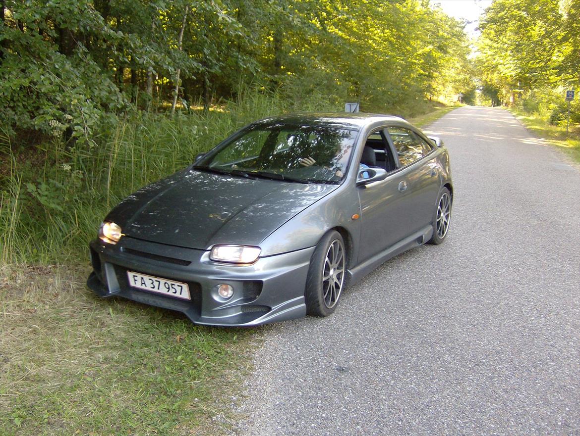 Mazda 323f SOLGT billede 6