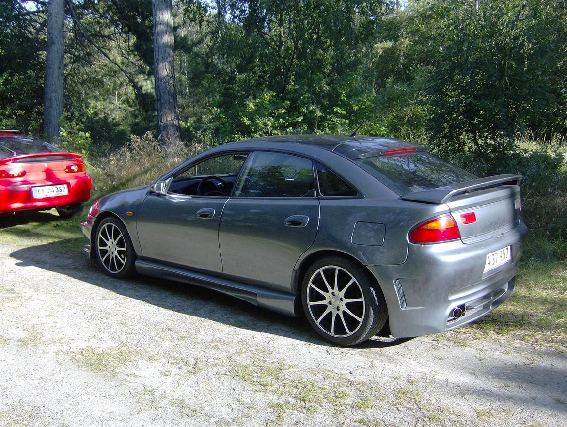 Mazda 323f SOLGT billede 10