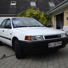 Mazda 323 1,6 Solgt