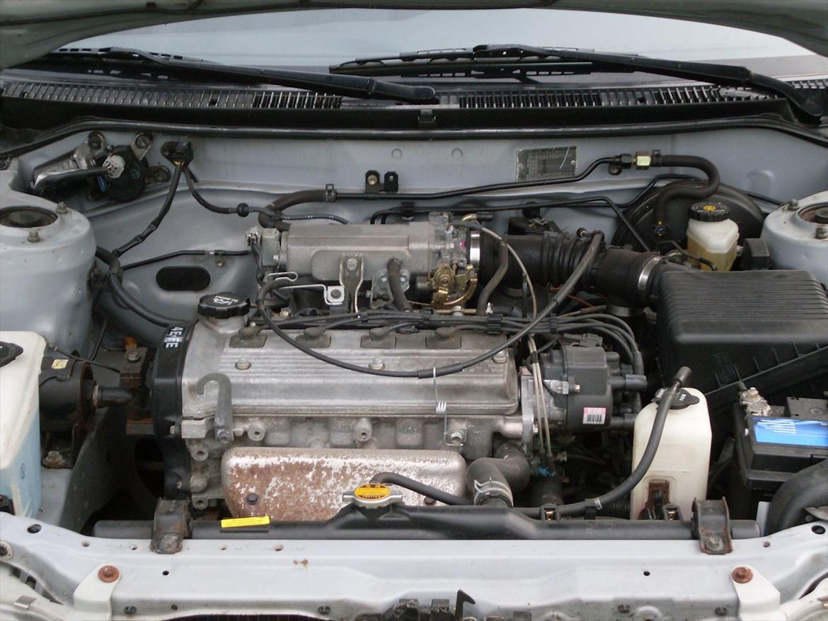 Toyota corolla 1,3 sedan beat - ja den ligner en ny billede 11