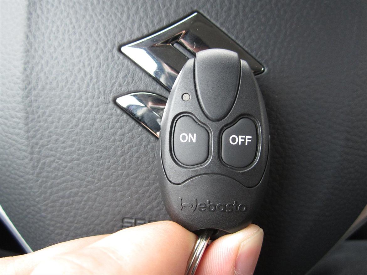 Suzuki Swift Eco+ S - Fjernbetjeningen til motor/kabine varmeren.. billede 14