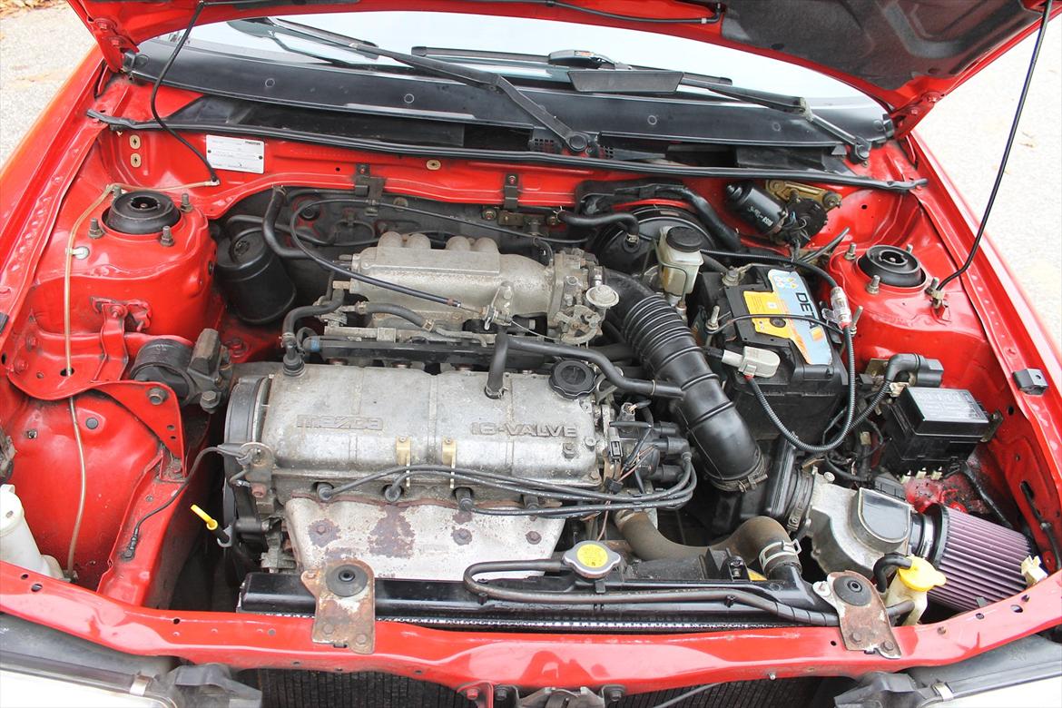 Mazda 323i (totalskadet) - Fin lille 1,3'er med 16ventiler så den trækker fint og siger som den skal :) billede 11