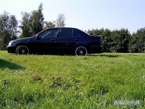 Nissan almera *SOLGT* billede 9