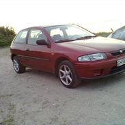 Mazda 323 1,5 LX *SOLGT*