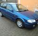Mazda 323F GLX solgt