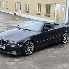 BMW 320i cabriolet solgt..