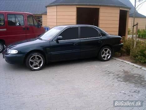 Kia clarus - her med sorte ruder  billede 12