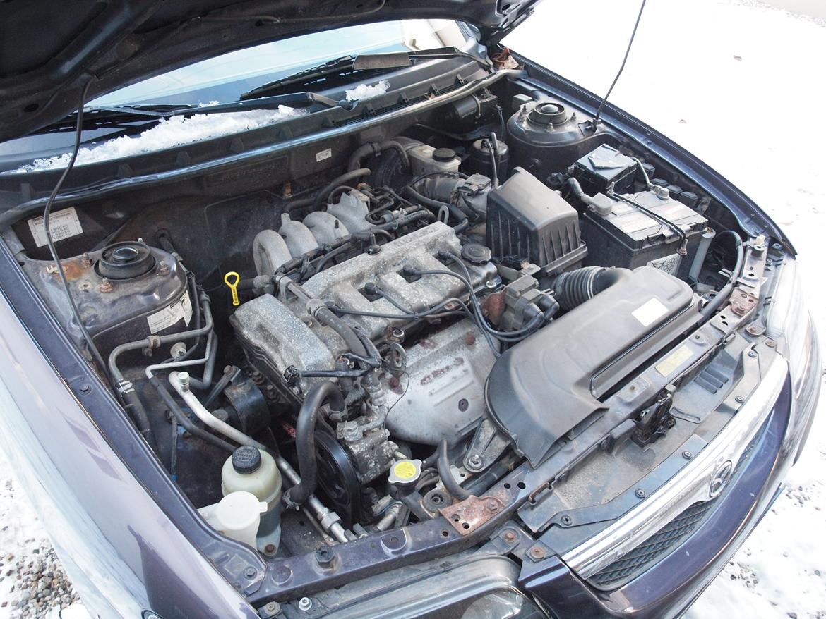 Mazda 626 1.8i LX st. car *SOLGT* billede 11