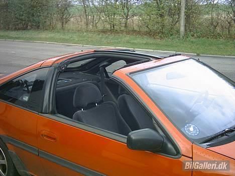 Nissan 100NX Targa *SOLGT* - targataget i funktion.. det er den bedste detalje på bilen.. billede 10