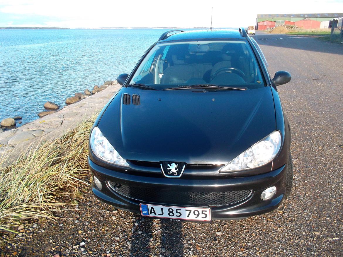 Peugeot 206 1,6 S 16 SW     Totalskadet billede 1