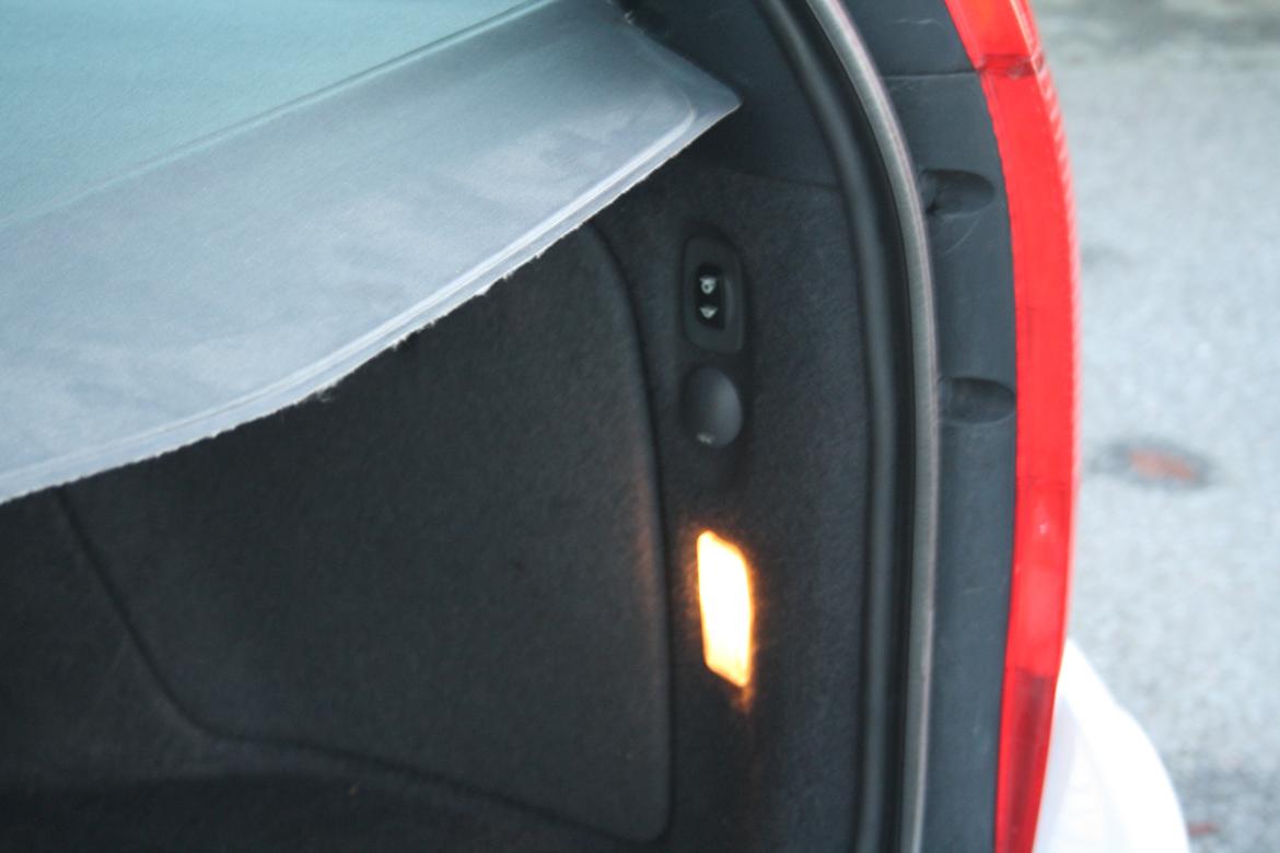 Citroën C5 Weekend - knap til at regulere lasthøjde billede 12