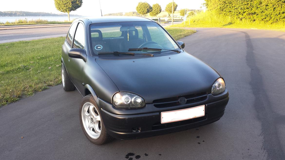 Opel Corsa 1.4i sport **SOLGT** billede 1