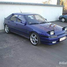 Mazda 323F GT. solgt