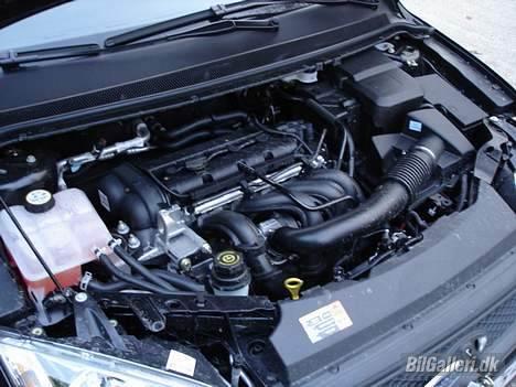 Ford Focus 1,6 Trend st. car - Her gemmer sig 100hk der gør det utroligt godt billede 6