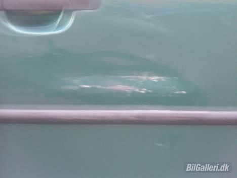 Ford Mondeo 2,0  Expressiv - Parkerings skaden tæt på billede 2