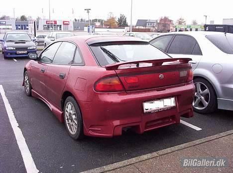 Mazda 323F Solgt billede 7