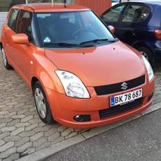 Suzuki Swift ( Madam Orange) Solgt