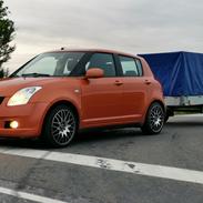 Suzuki Swift ( Madam Orange)