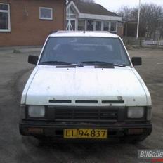 Nissan King Cap 2.5 Solgt.