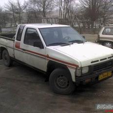 Nissan King Cap 2.5 Solgt.