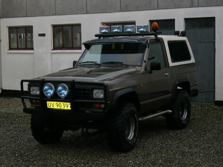 Nissan patrol 3,3 TD Solgt - med det hjemme byggede gitter, og 2" body lift.. det er blevet meget godt billede 1