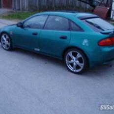 Mazda 323f BA SOLGT