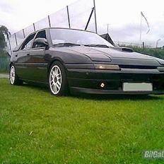 Mazda 323 f gt Solgt