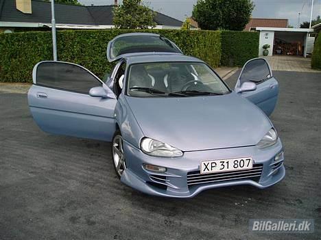 Mazda MX3 SOLGT billede 1