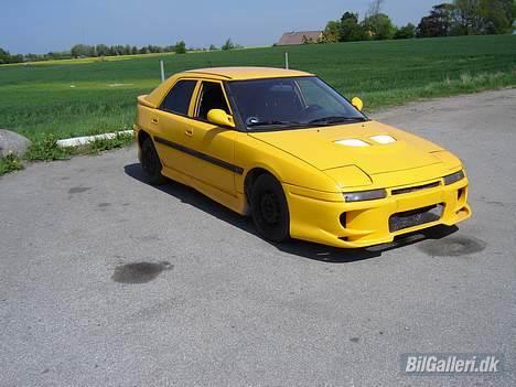 Mazda 323F SOLGT! billede 6