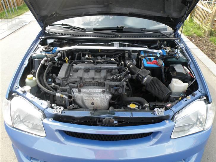 Mazda Aqua 323F BJ solgt - fælge inde blev malet blå perlemor billede 15