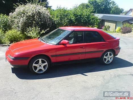 Mazda 323F - taget med tlf billede 6
