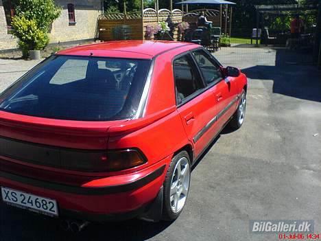 Mazda 323F - taget med tlf billede 8