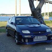 Mazda 323 c solgt