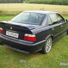 BMW 320i solgt..