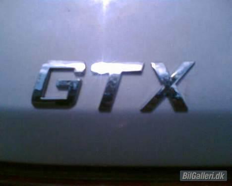 Mazda 323 1,6 gt/x 2talt skadet - det er jo lii det det er  billede 3