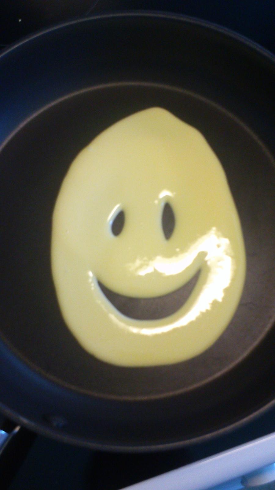 underligt mad  - hehe min mor skulle til at lave mad og så hælde hun noget flydene magarine på som så lavede dette ansigt min mor ventede med at starte på at lave maden indtil jeg kom hjem og fik nogle billeder af det :D billede 16