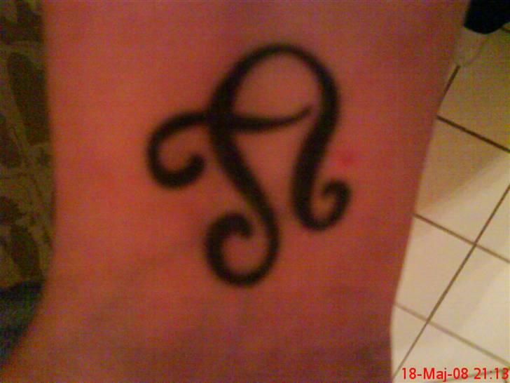 Mine tattoos - Nr 3, mit stjernetegn løven med et t i for mit fornavn Terese billede 3