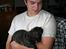 Boerboel Thor bamse - ligger trygt i thomas arme