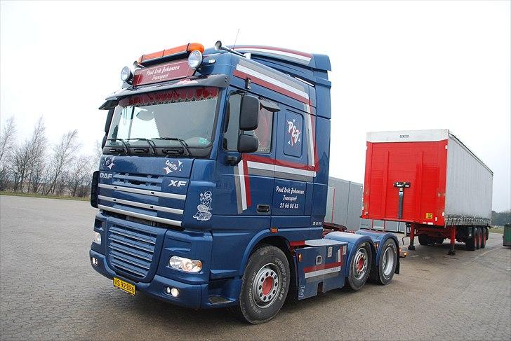 DAF 105.410 - Fyraften, og har sat traileren på DSV i Øm billede 1