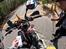 Mellemamerika, KTM 690 Enduro R - . . . . . . . . . . . . . . . . . . . . . . .  . . . . . . . . .5 minutter senere bliver alt registreret igen. Jeg peger på bogstaverne KTM, da han ikke kender mærket.