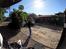 Mellemamerika, KTM 690 Enduro R - . . . . . . . . . . . . . . . . . . . . . . . . . . . . . .I Santiago har jeg fundet Travelers Hostal. Ejeren der her lukker mig ind er fra Jamaica.