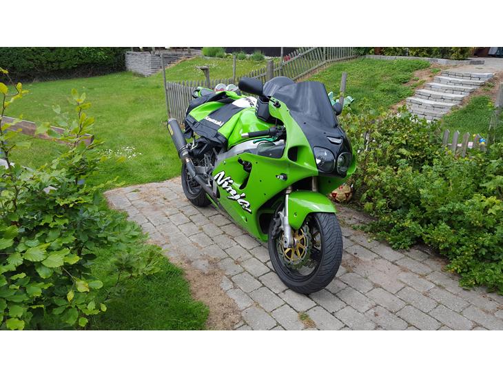 {{currentPhoto.altText}} billede {{currentPhoto.number}}