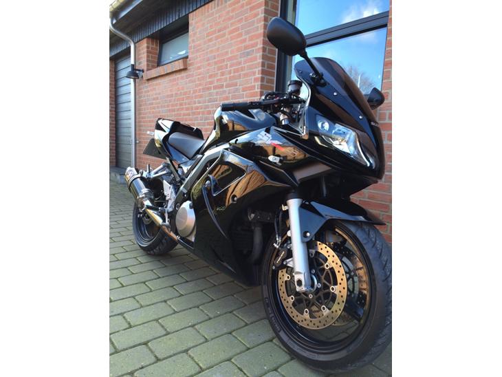 {{currentPhoto.altText}} billede {{currentPhoto.number}}