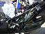 Suzuki DL V-strom 650 AK 7 - Venstre side under bagerste dæksel med adskildte ledninger er ved at montere gearindikator.