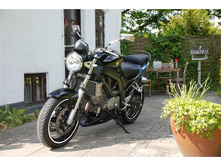 {{currentPhoto.altText}} billede {{currentPhoto.number}}